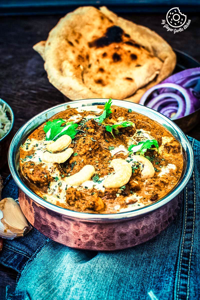 there is a bowl of food with some bread and vegetables