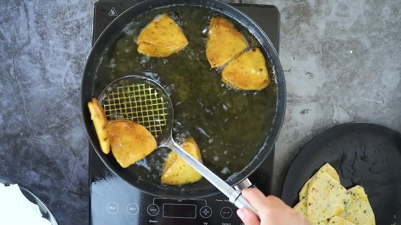 Image of the recipe cooking step-4-4 for Cheese Garlic Masala Mathri (Fried, Air Fryer, Baked Recipe)